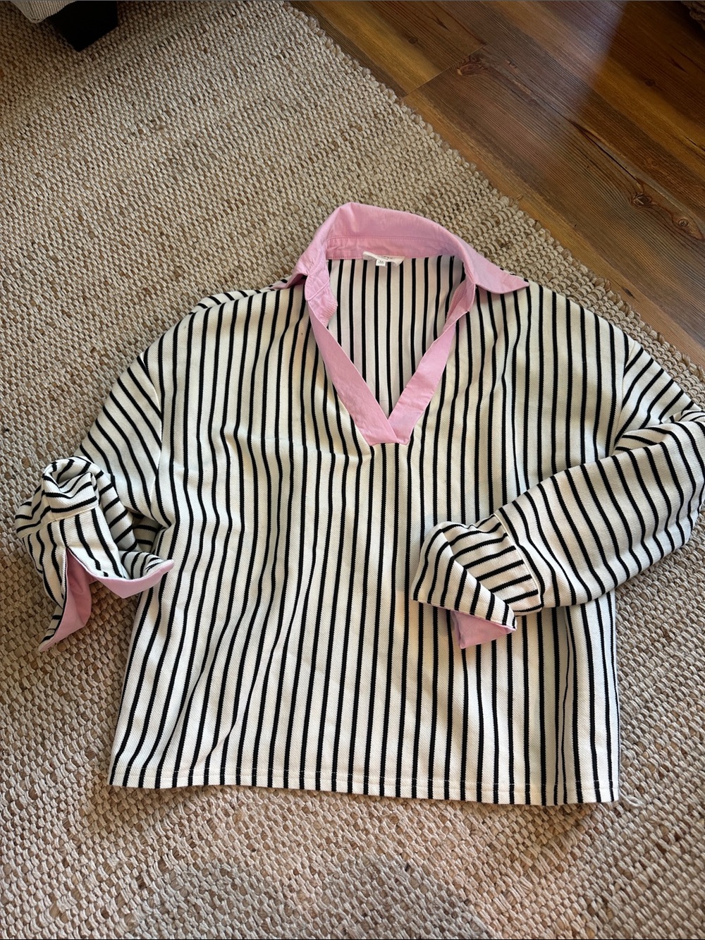 Able Black-and-White Striped Sweater with Pink Collar